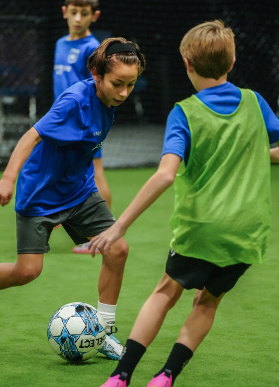 Coach Andreas teaching two clients